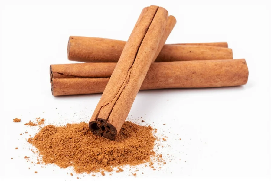 Close-up view of cinnamon sticks showing their distinctive rolled bark structure