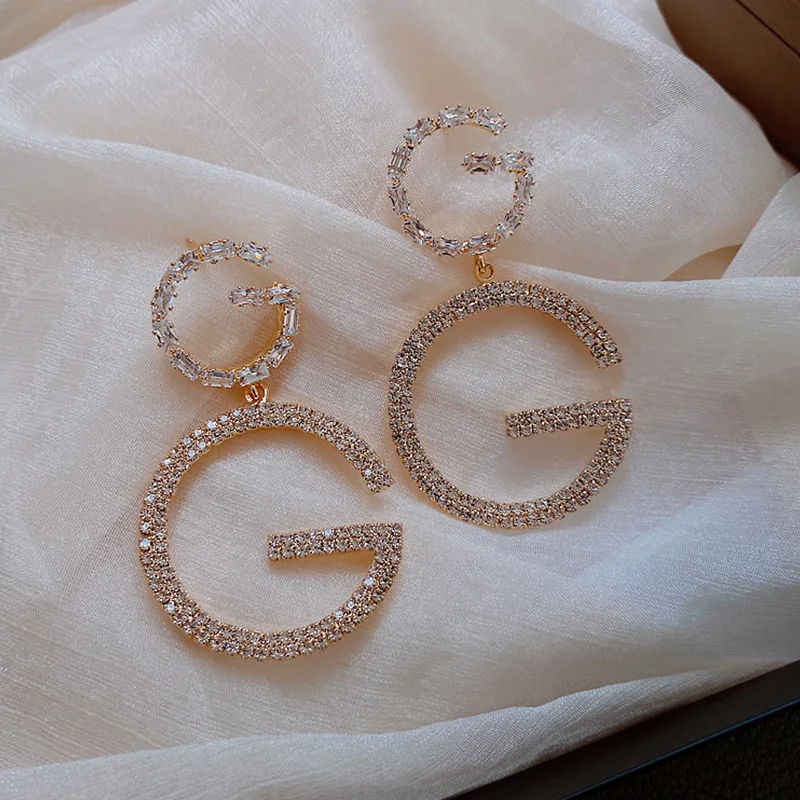 

2021 Irregular 18K Gold Plated Geometric Initial Letter Earrings Bling Rhinestone S925 Letter Gg Earrings, Picture