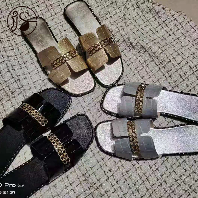 

New style ladies outer slippers for women and ladies Rivet metal chain character slippers Fashion flat floor ladies slippers, Picture