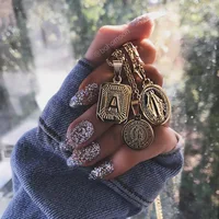 

Fashion 26 gold letter pendant necklace for women Wholesale N91126