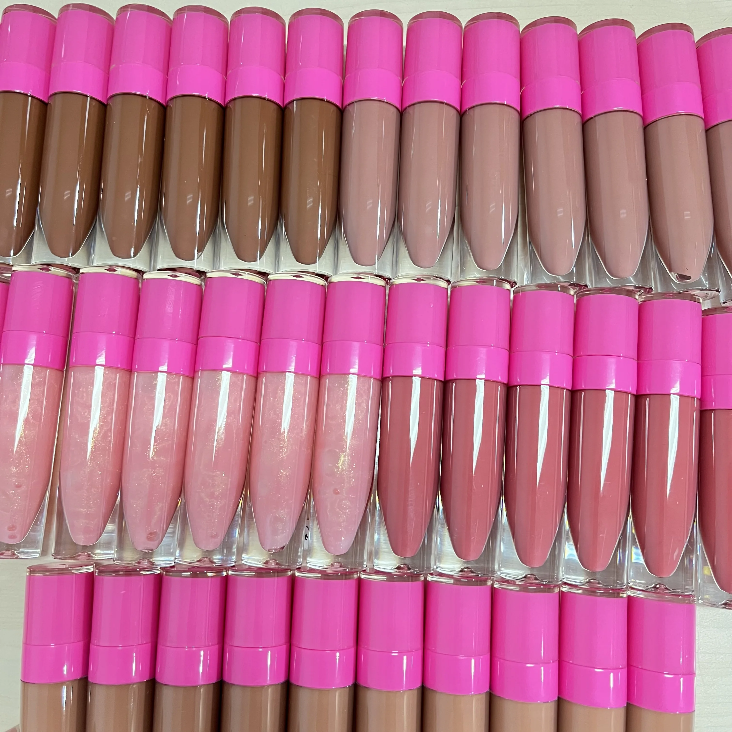 

Lip gloss vendor wholesale hot pink tubes glossy nude lipgloss private label
