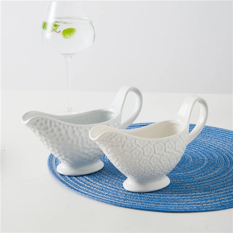 
Unique japanese restaurant spice container seasoning jug custom cheap large white ceramic sauce gravy boat 