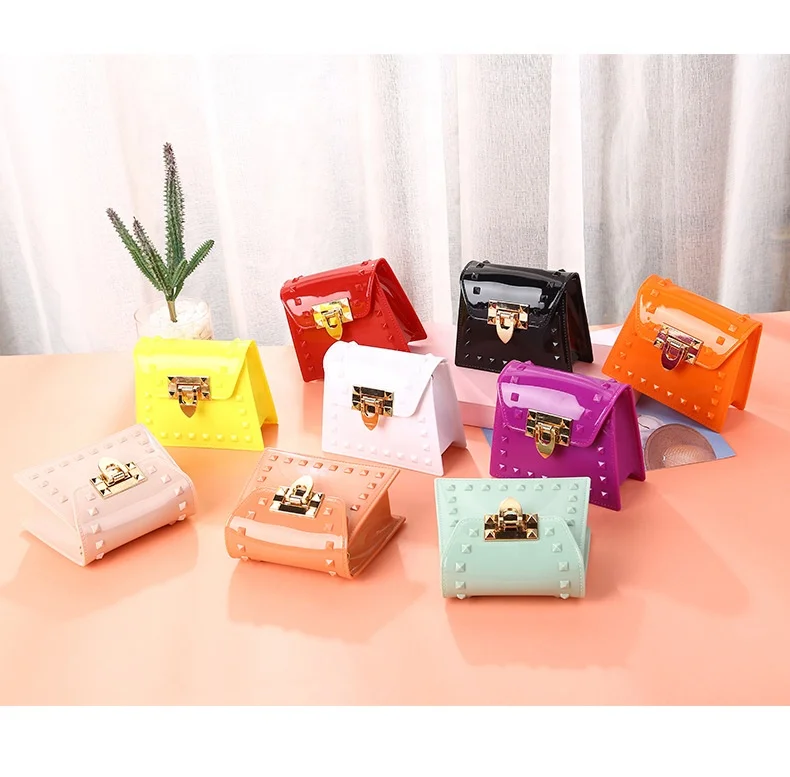 

Latest Arrival New Rivet Mini Chain Crossbody Bag PVC Candy Color Small Cosmetic Jelly Bag For Girls, Custom colors