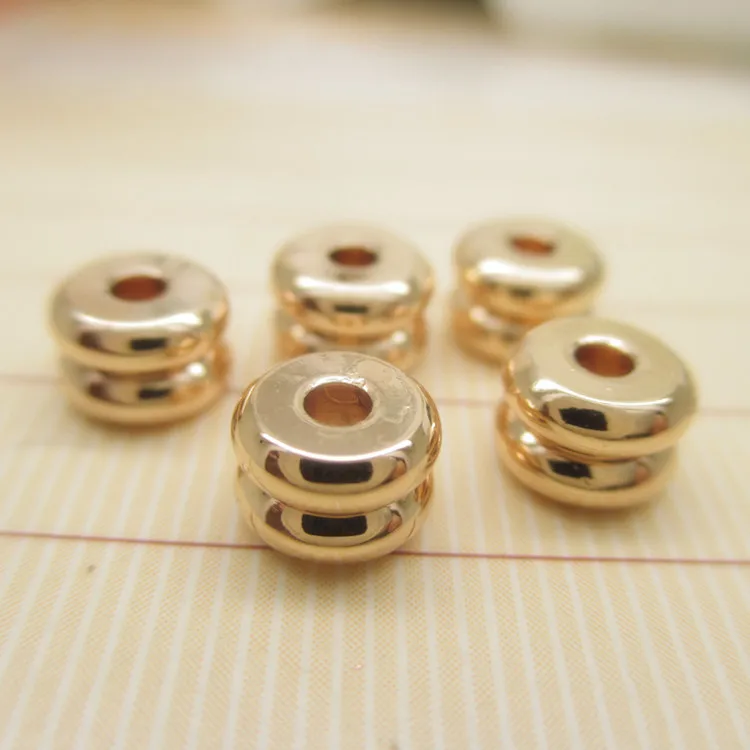 

Wholesale  Flat Round 24K Gold Filled Spacer Beads for jewelry making