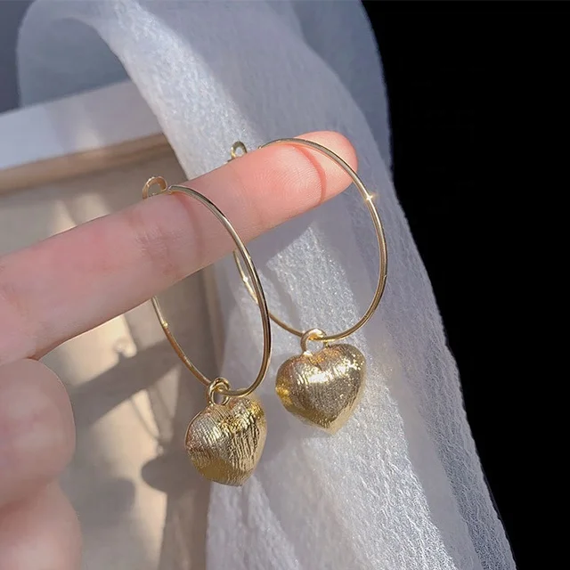 

Adelante Wholesale Retro Hong Kong Women's Long Style Simple Cool Wind Air Love Earrings, Gold