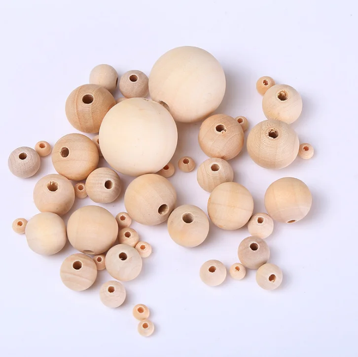 

Xianghong Custom Wooden Beads For Jewelry Making Round Big Hole Wood Bulk Beads 8-50MM Inner Diameter 4-10mm, White