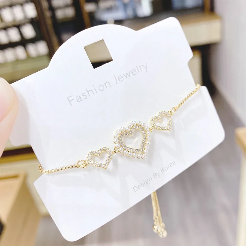 

SL60453 Fashion design gold plated brass zircon women jewelry pearl heart charm bracelets