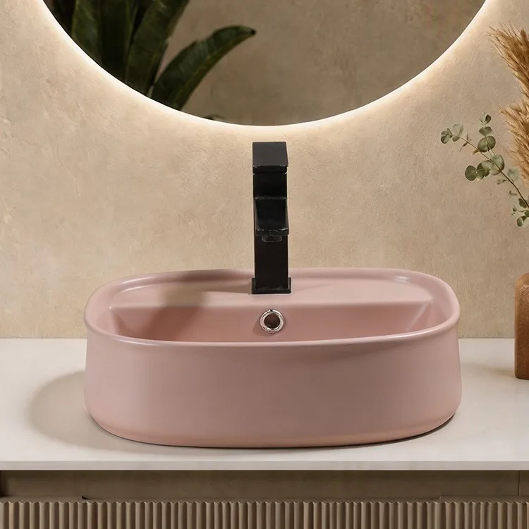 baby-pink-bathroom-sink-9879A-MT-013-front-profile-flared-petal-lip-and-rear-overflow-aperture baby-pink-bathroom-sink-9879A-MT-013-front-profile-flared-petal-lip-and-rear-overflow-aperture