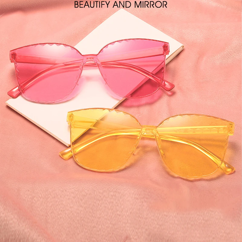 

Hot Sale Candy Color Transparent Sunglasses Colorful Cat Eye Clear Rimless Sunglasses Women