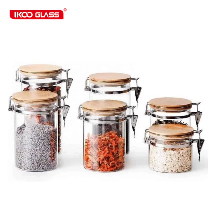 

Glass Canister Set spice jars with bamboo lids Kitchen Storage Containers for Flour Coffee Sugar Cereal Pasta Spice Candy