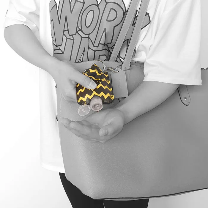 Big promotion new design leather 50ml hand sanitizer bottle holder keychain from china