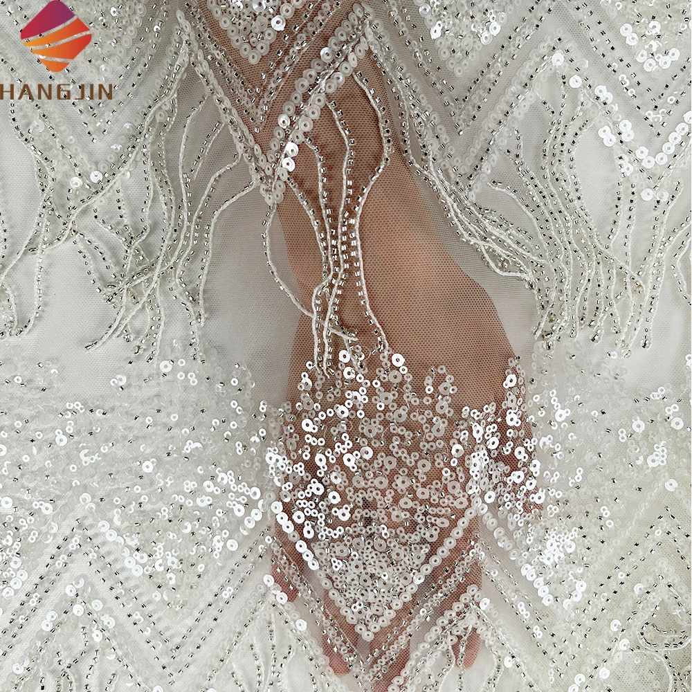 High Quality White Heavy Beaded Embroidered Lace Fabric With Sequins Tassel Design Luxury Tulle Mesh Lace Fabric for Wedding
