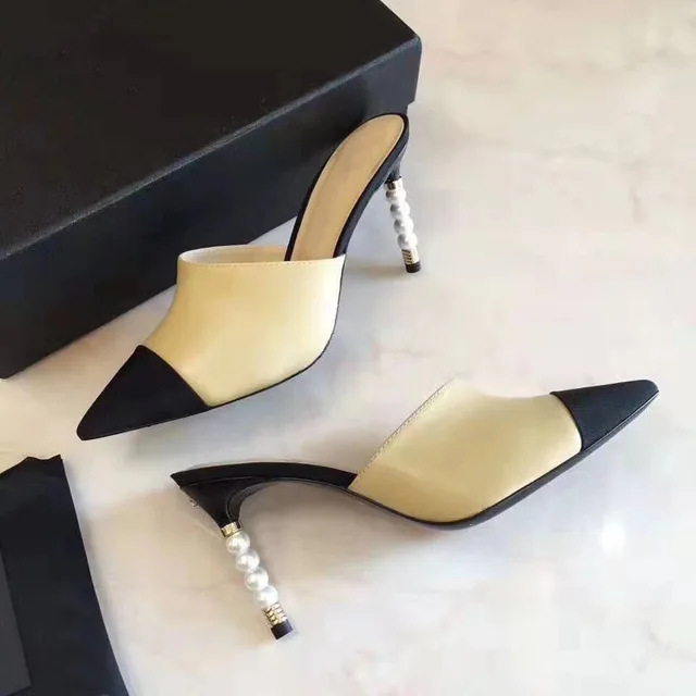 

Spring and summer new European and American pointy stiletto matching color bag head out slippers pearl slippers with temperament