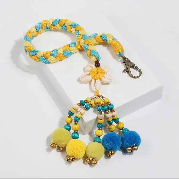 
wholesale boho fur ball drop key chain braid tassel key chain with shell beaded for travel gift 