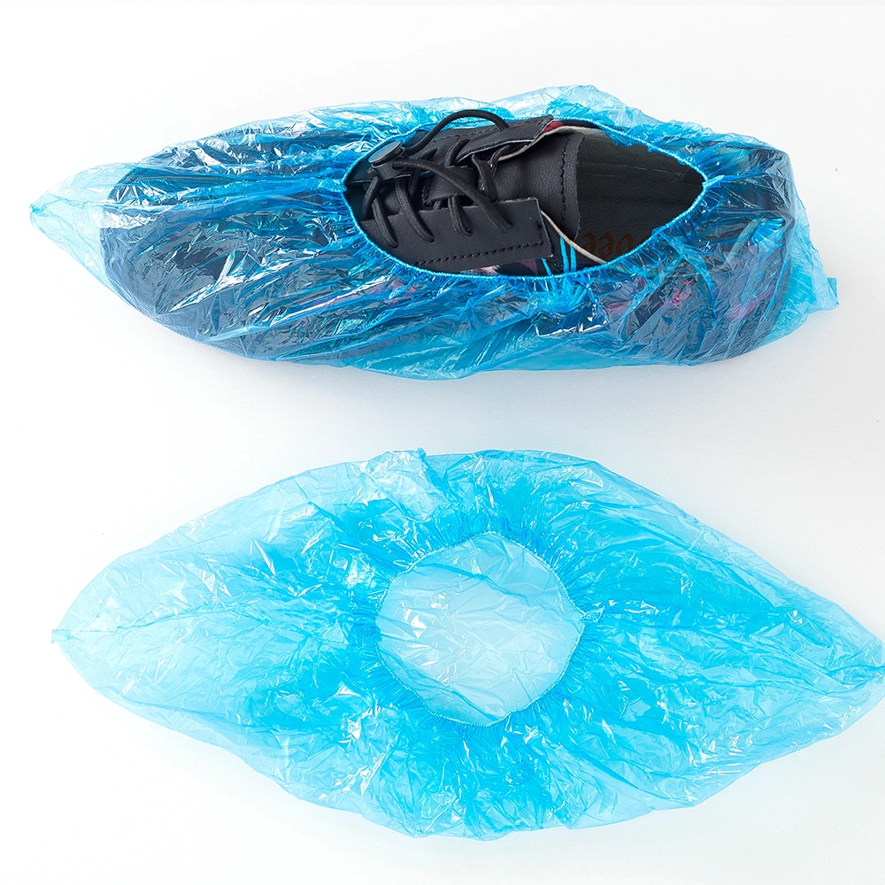 
Disposable waterproof and dustproof plastic PE shoe cover factory direct sale  (1600077171156)