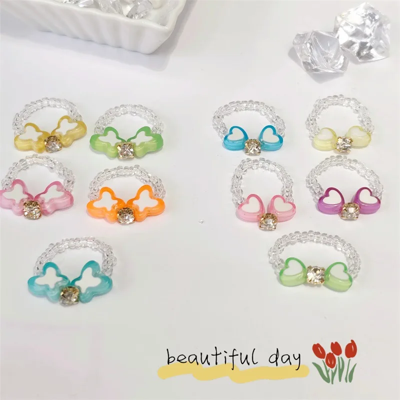 

OUYE 2021 Acrylic Ring handmade elastic  Chain beaded butterfly heart hand woven Ring For Women Girls Gift beads, Colorful