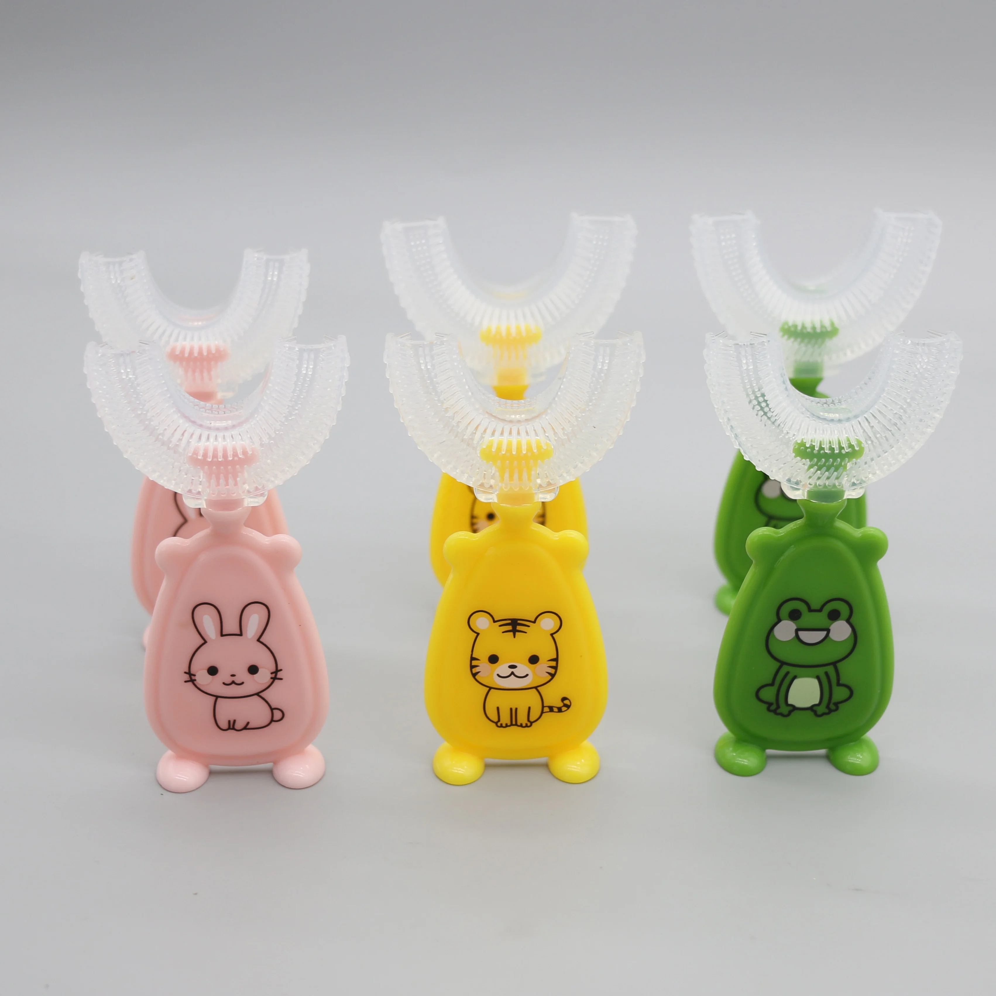 

Tiger Rabbit Frog Shape Kid Manual Food-Grade Silicone Brush Head 360 Degree Oral Cleansing Replaceable Tiger U Shape Toothbrush, Green/yellow/purple or customized color