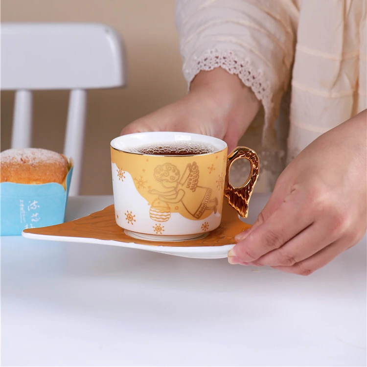 

HY Nordic Luxury Coffee Cup And Saucer Set Angel Gold-painted Couple Mug Heart-shaped Plate Creative Cup