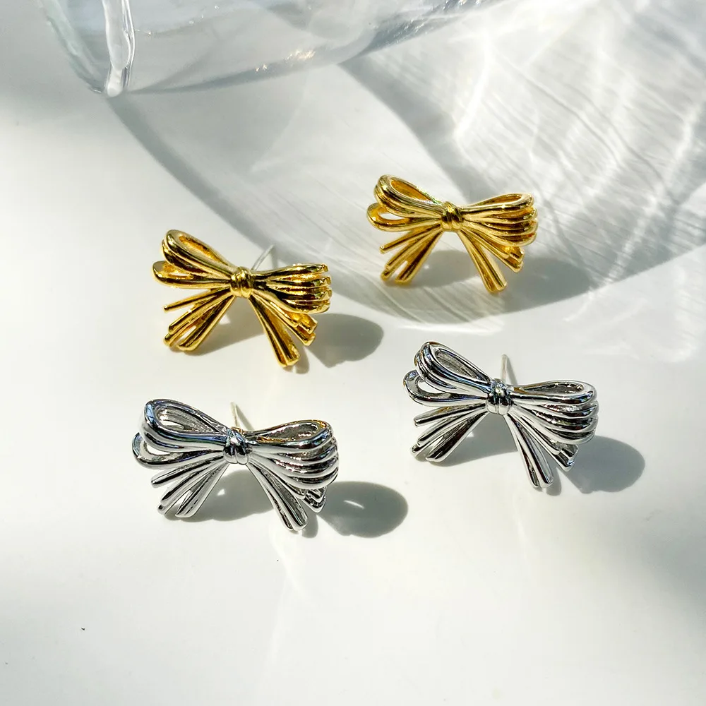 

Amazon Hot Sale Fashion 925 Sterling Silver Needle Bowknot Earring 18K Gold Plated Exquisite Bow Stud Earring for Women, Gold/silver