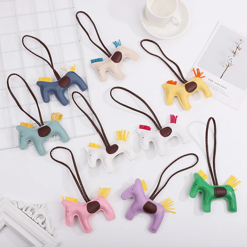 

Pony tassel custom pendant PU leather sewn horse shape bag accessories, Picture