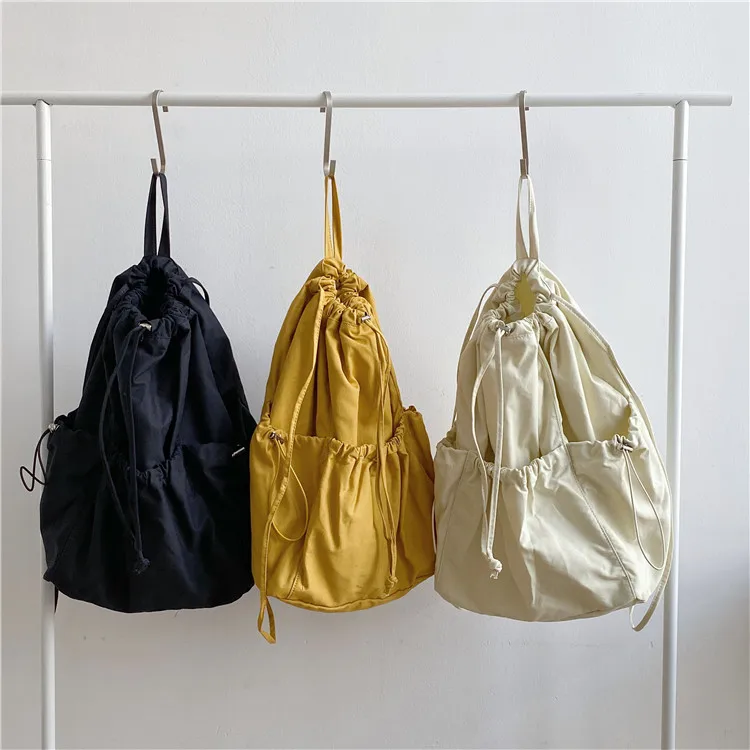 

New female fashion trend large capacity single shoulder bag leisure nylon backpack creative design drawstring bucket bag