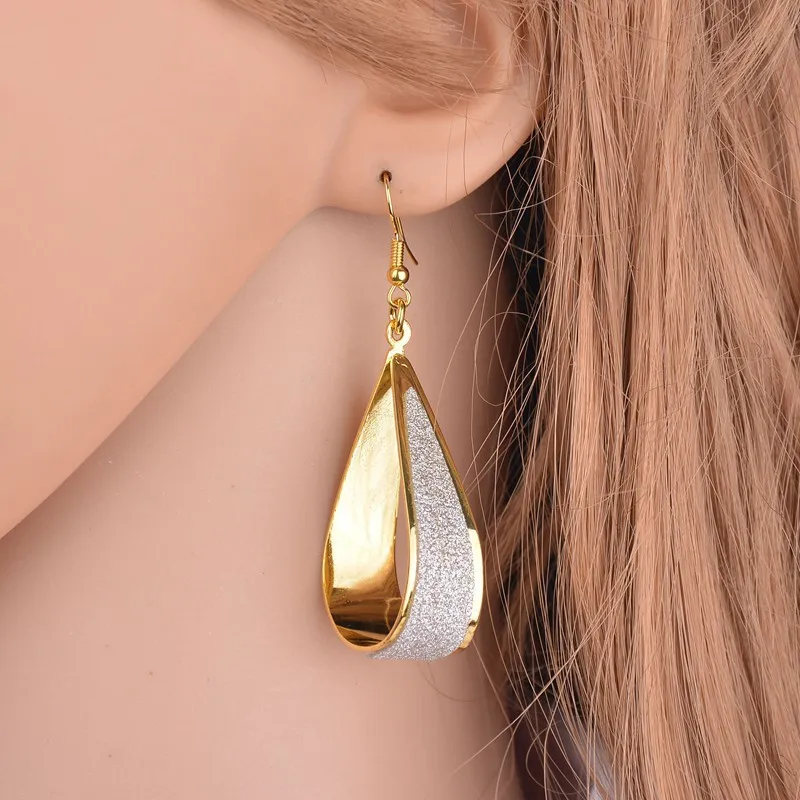 

KOMI Punk Twist Spiral Scrub Jewelry Geometria Lines Silver Gold Black Long Hoop Earrings for Women, As picture