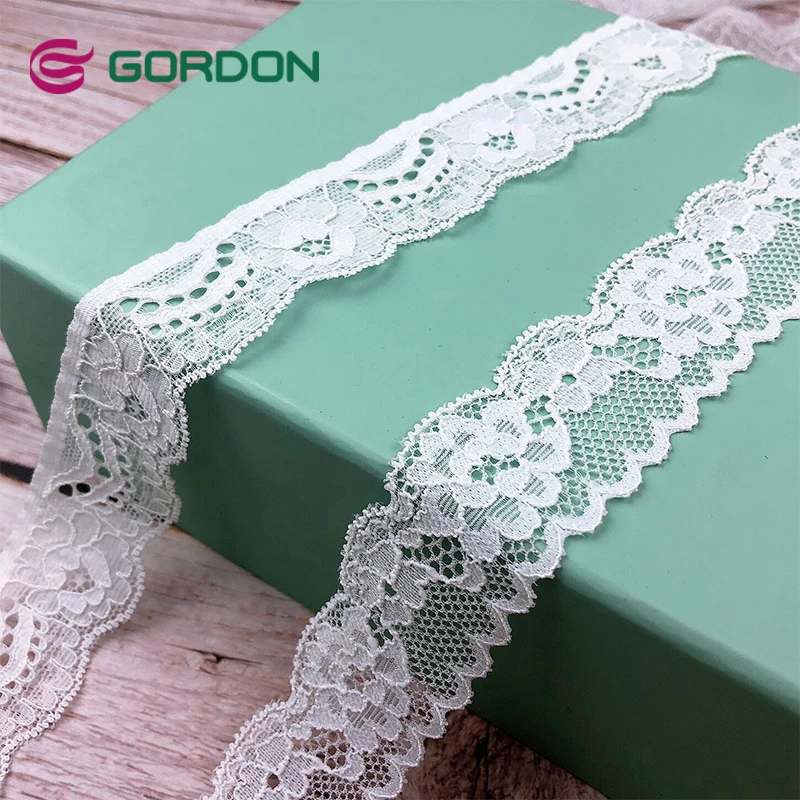 

Factory Direct Supplier Fancy White Embroidered Decorative Elastic Stretch Ribbon Stretch Lace Trim with Ribbon, White, ivory