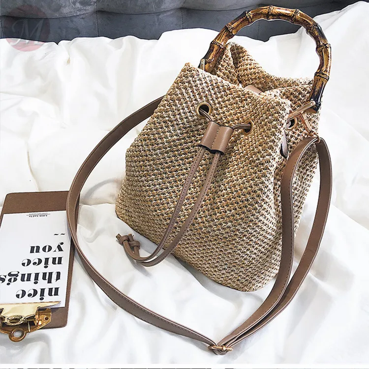 0270406 Hot sale 2020 hollow solid color bucket simple Best Cross Body Straw plaiting Lady bag handbag