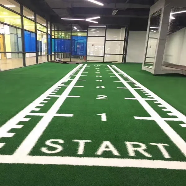 

Artificial grass turf for indoor gym sled running track