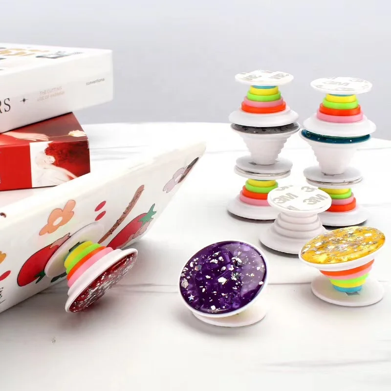 

factory sale rainbow phone bracket popular mobile phone holder air bag colorful cell phone socket