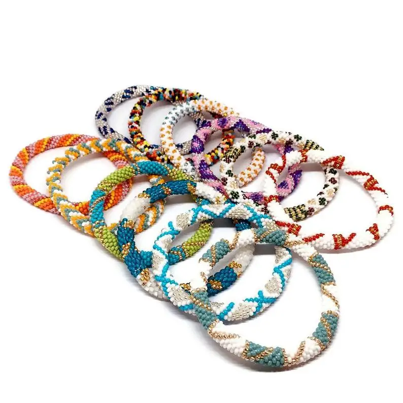 

Handmade Nepal Bracelets by Ramila Beads Colorful Nepal Glass and Seedbead Bracelets, Gold