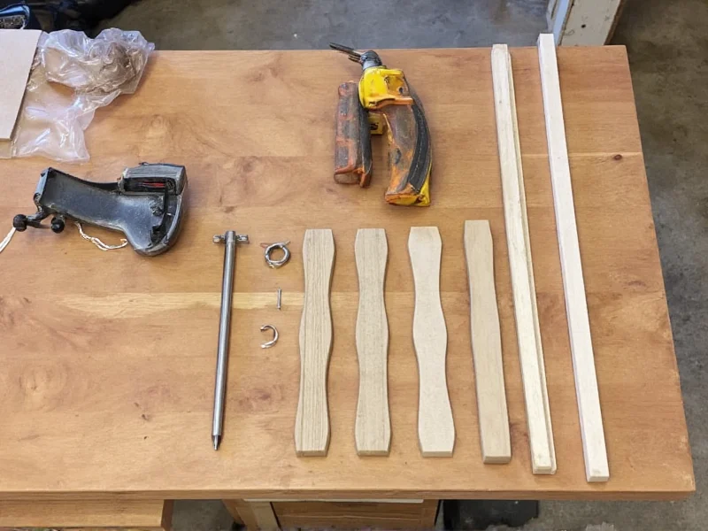 DIY squirrel baffle materials laid out on workbench