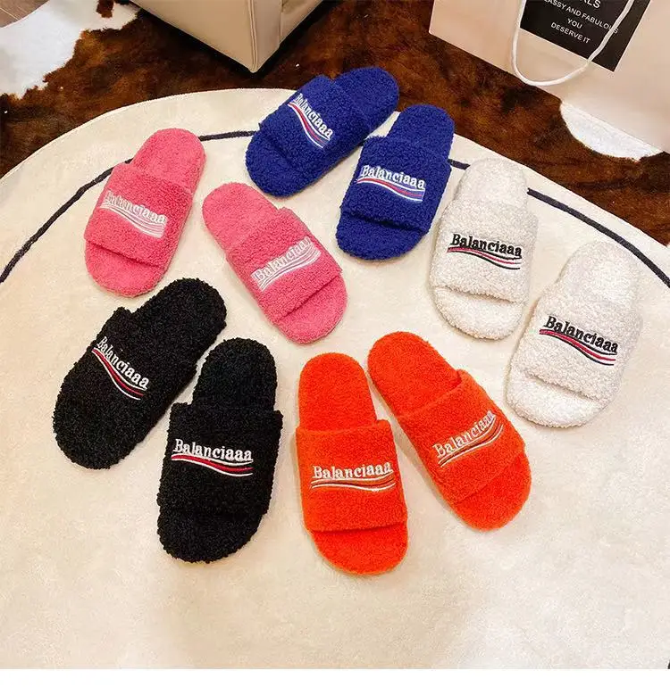 

2021 fashion Luxury imitated Lamb Wool Faux fur slippers Flat winter sheepskin Warm Fluffy Slippers for women ladies