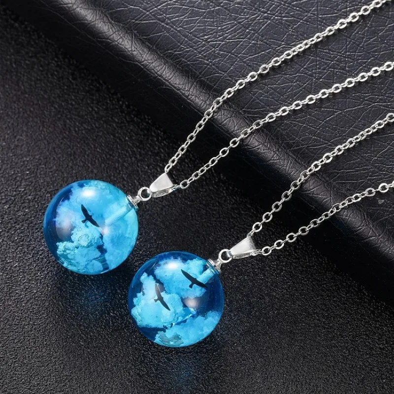 

New Design resin small clear blue sky ball white cloud Necklace lovely spherical eagle moon light custom glass ball Jewelry