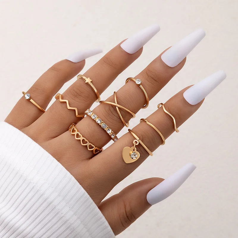 

New Light and Luxury Simple Cross Multi piece Ring Set Personality Love Hollow out Ten piece Ring Set