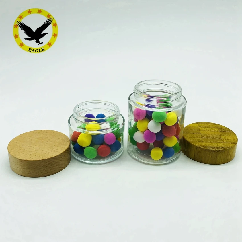 

Wholesale 4oz round glass jar 2oz child proof glass jar with bamboo wooden lid, Clear