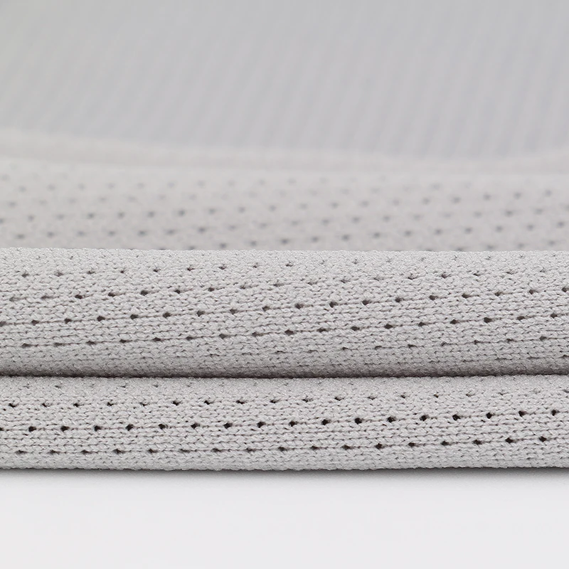 
Low elastic mesh fabric for garment lining 
