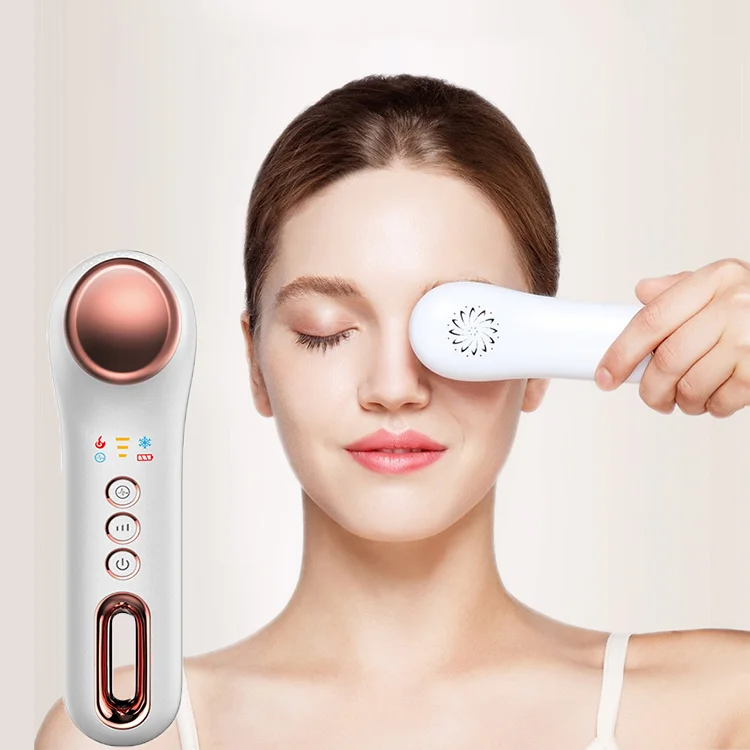 

Therapy electric vibration heated hot and cold device for under eye massager wand with warm vibrating