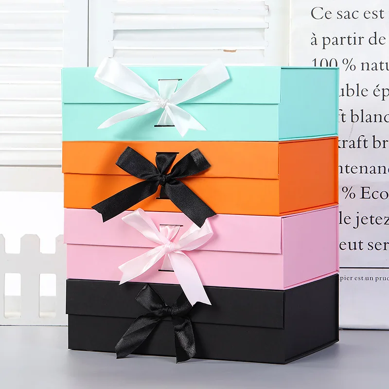 

Free sample charge Luxury Flat Pack Folding Cardboard Paper Pink Box Ribbon Closures Book Shaped Foldable box foldable gift box