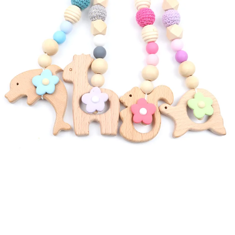 

New Food grade wooden baby pacifier holder,baby pacifier chain clip holder, Any paton colour code is avilable