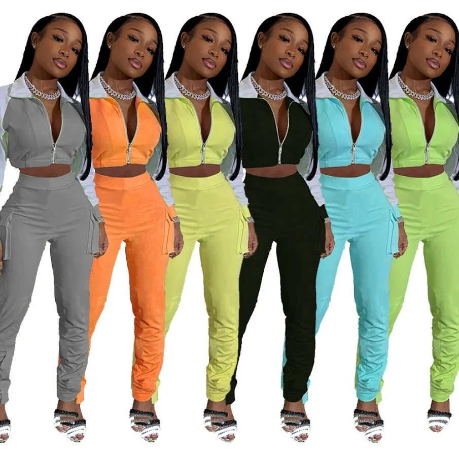 

MT251-2054 Women's clothing wholesale fashion color matching leisure sports luminous strip pocket two-piece suit women clothing