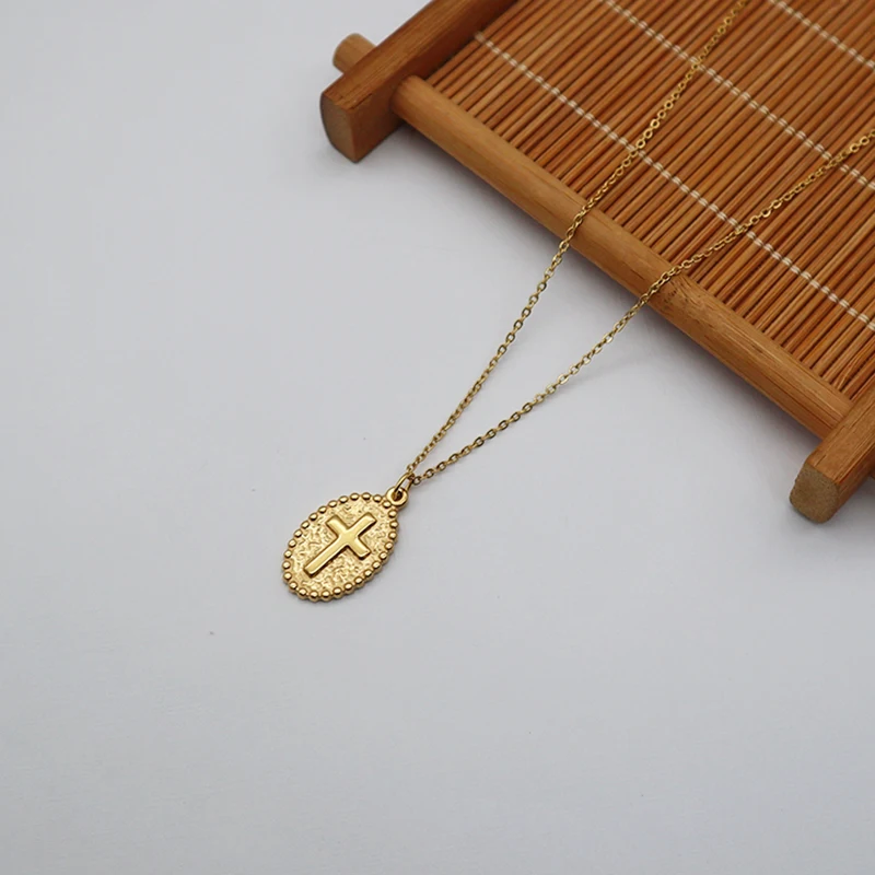 

Simple cross pendant with 18K gold plated stainless steel chain necklaces