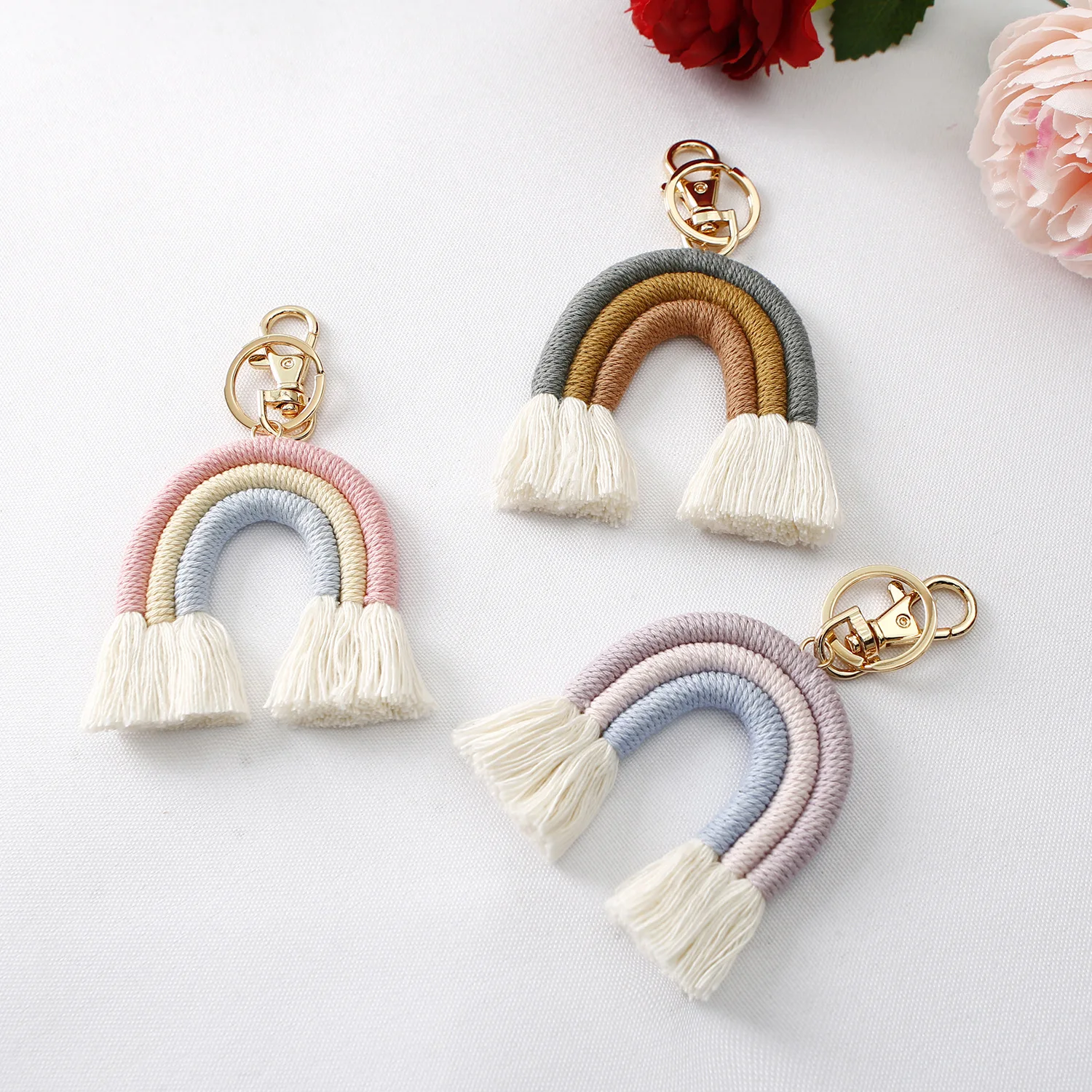 

Wholesale Boho Colorful Tassel Cute Gift Handmade Cotton Mini U Shape Rainbow Key Chain For Bag