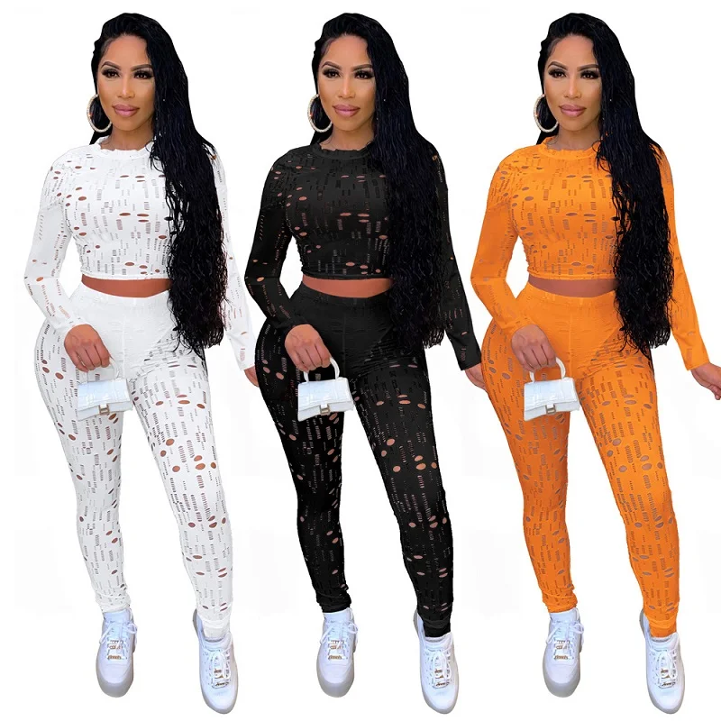 

Sexy Long Sleeve Bodycon Hollow Out Jogger Suit Ripped Round Neck Solid Sports Pant Causal Crop Top Two Piece Set Women Clothing