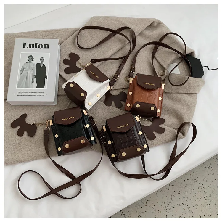 

2021 New simple PU material rivet lock lock square shoulder bag girl's shopping purse phone handbags, 4 colors