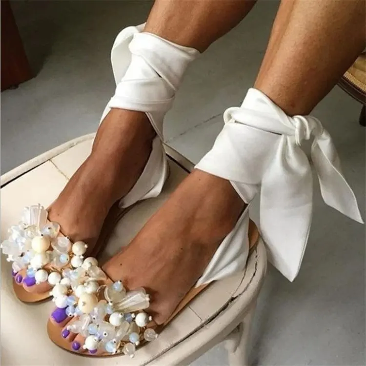 

Factory in Stock New 2021 Summer round toe flat beach shoes fashion beaded ankle lace bow strap ring sandals for women