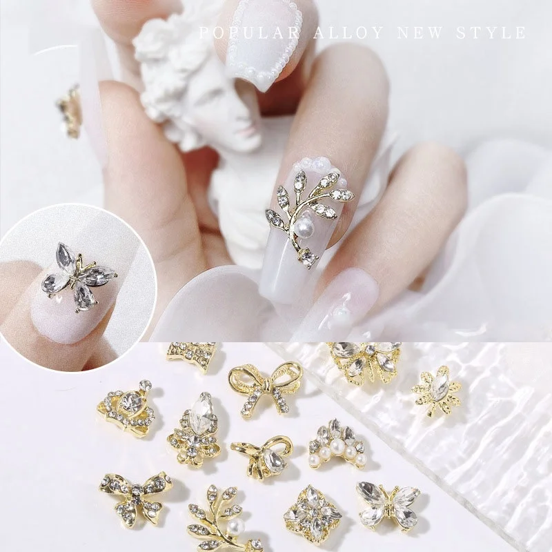 

Paso Sico 2021 New Designs Metal Zircon Diamond Gemstone Shiny 3D Nail Art Charms with Crown Pearls Bear Decoration