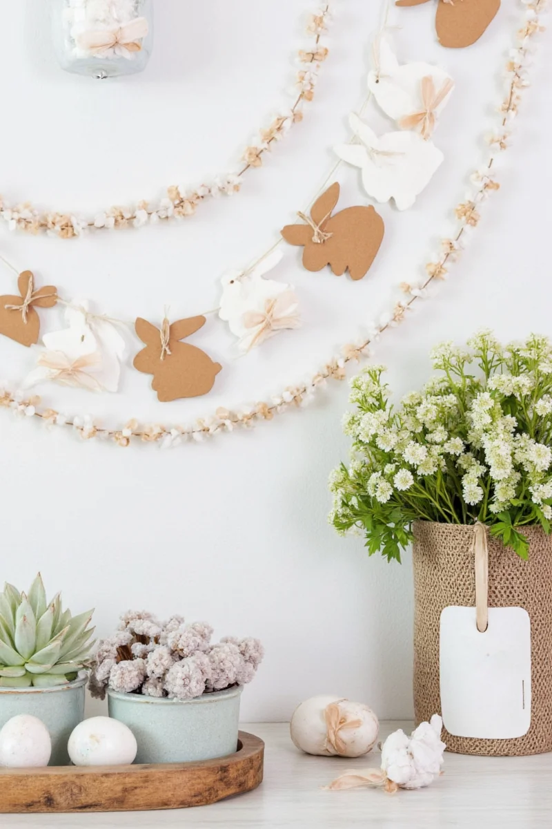 DIY carrot-shaped candle holders on a windowsill