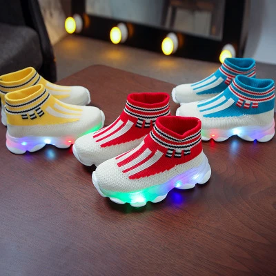 

Newest design high top flying knitted led running sneakers casual slip-on kids luminous lights sock sport shoes