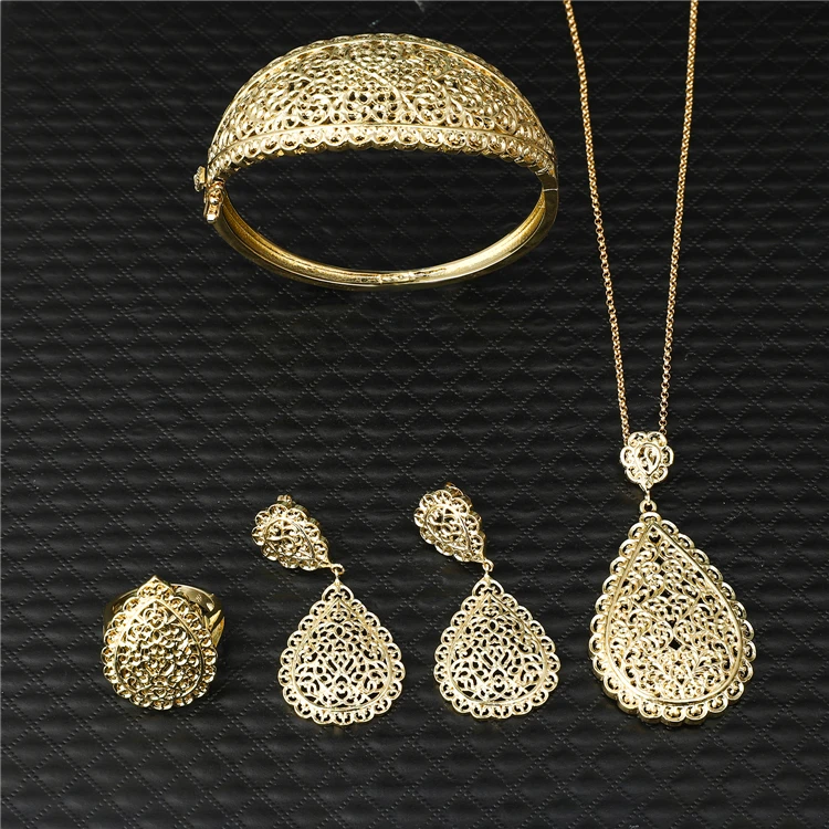 

2021Mar Hot Selling Hollow Out Caftan Retro wedding Gold Planted Jewelry Set for Women New Design Fashion Jewelry Set, Picture shows